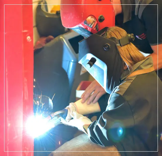 Professional Welder Teaching a Newbie How to Weld